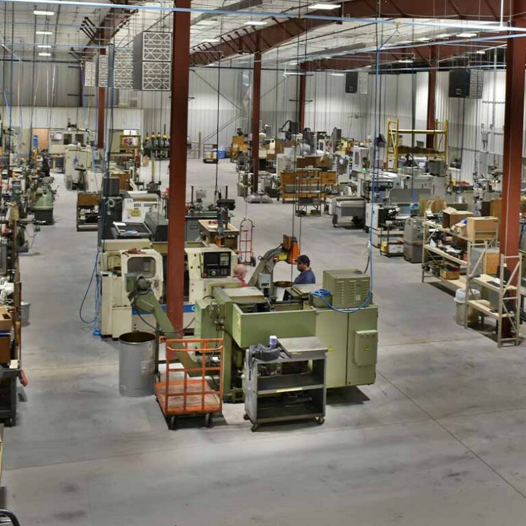 Factory Workers In Warehouse